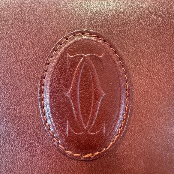 Authentic Cartier clutch bag with authenticity card